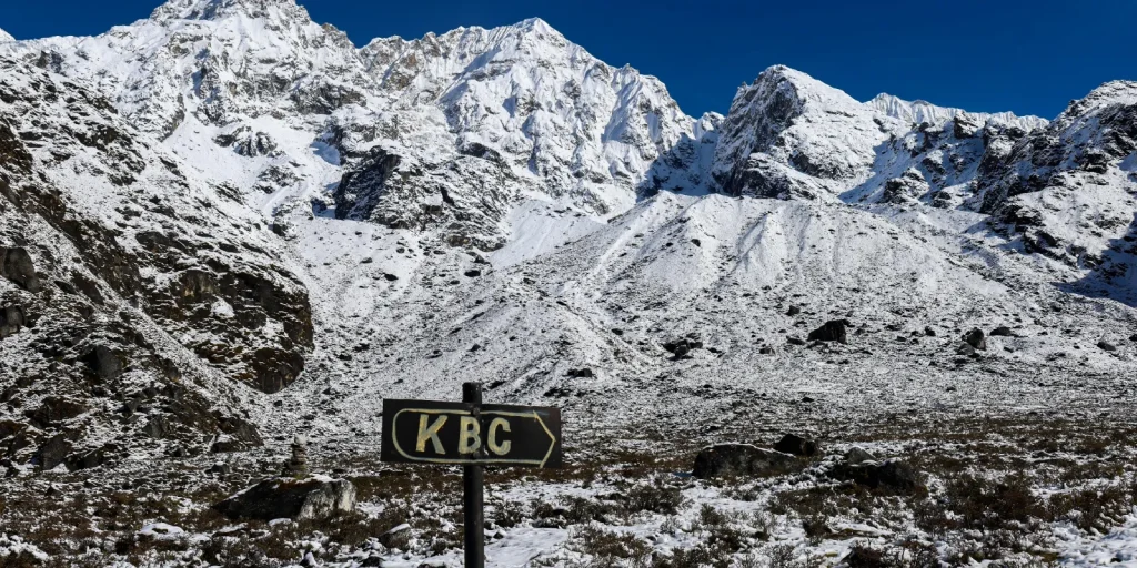 Signboard pointing to Kanchenjunga Base Camp (KBC)