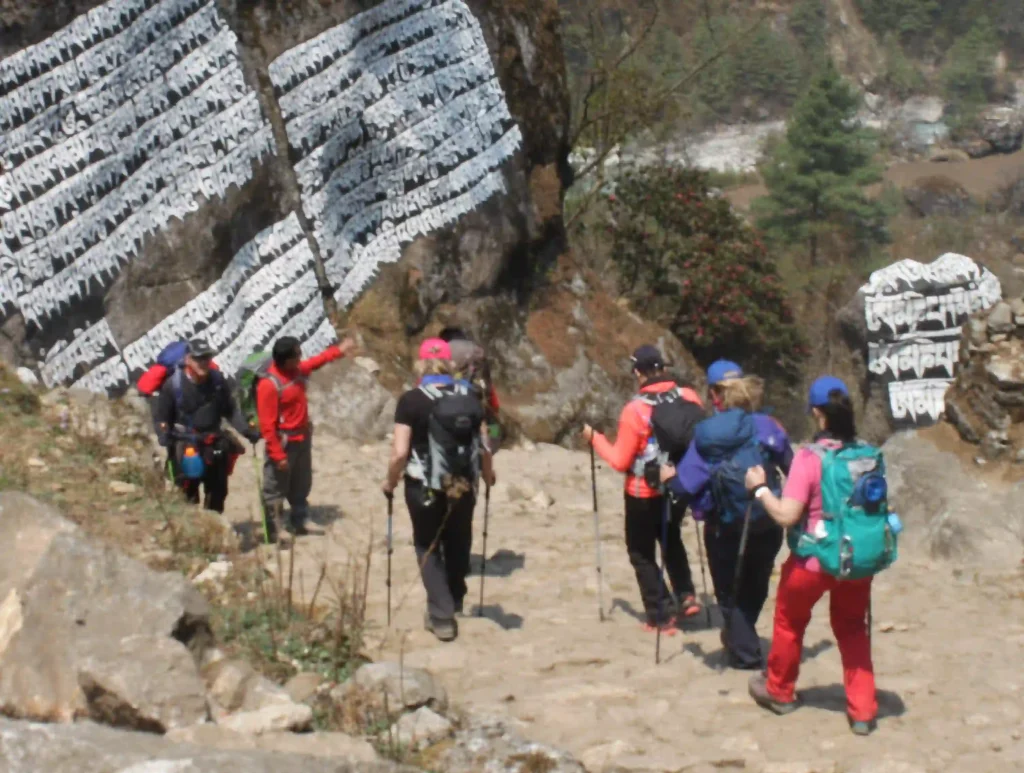 Group of trekkers with Adjustable Trekking Pole, Heavy-Duty Nalgene Bottles and other essentials